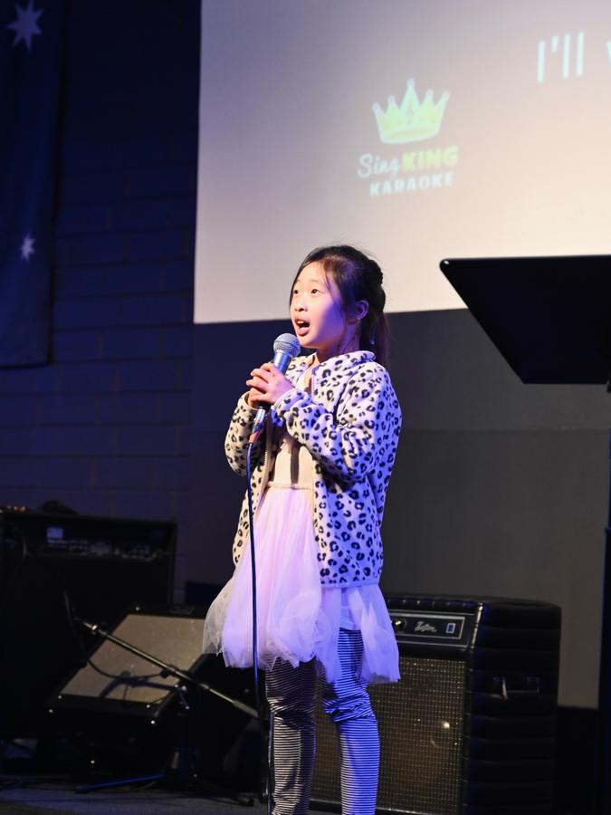 A worship leader singing