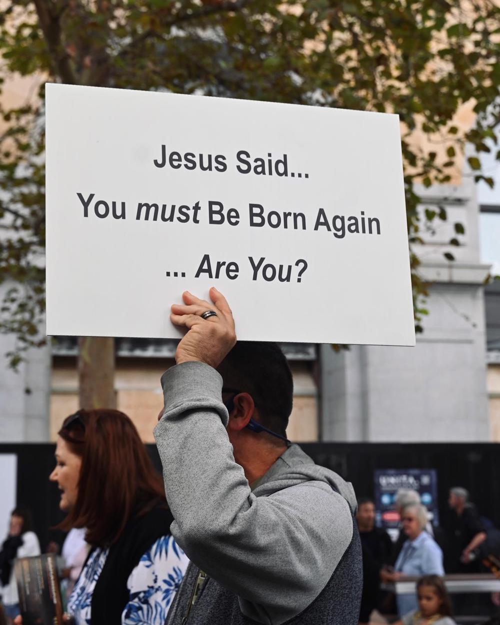 A sign reading 'Jesus said, you must be born again'
